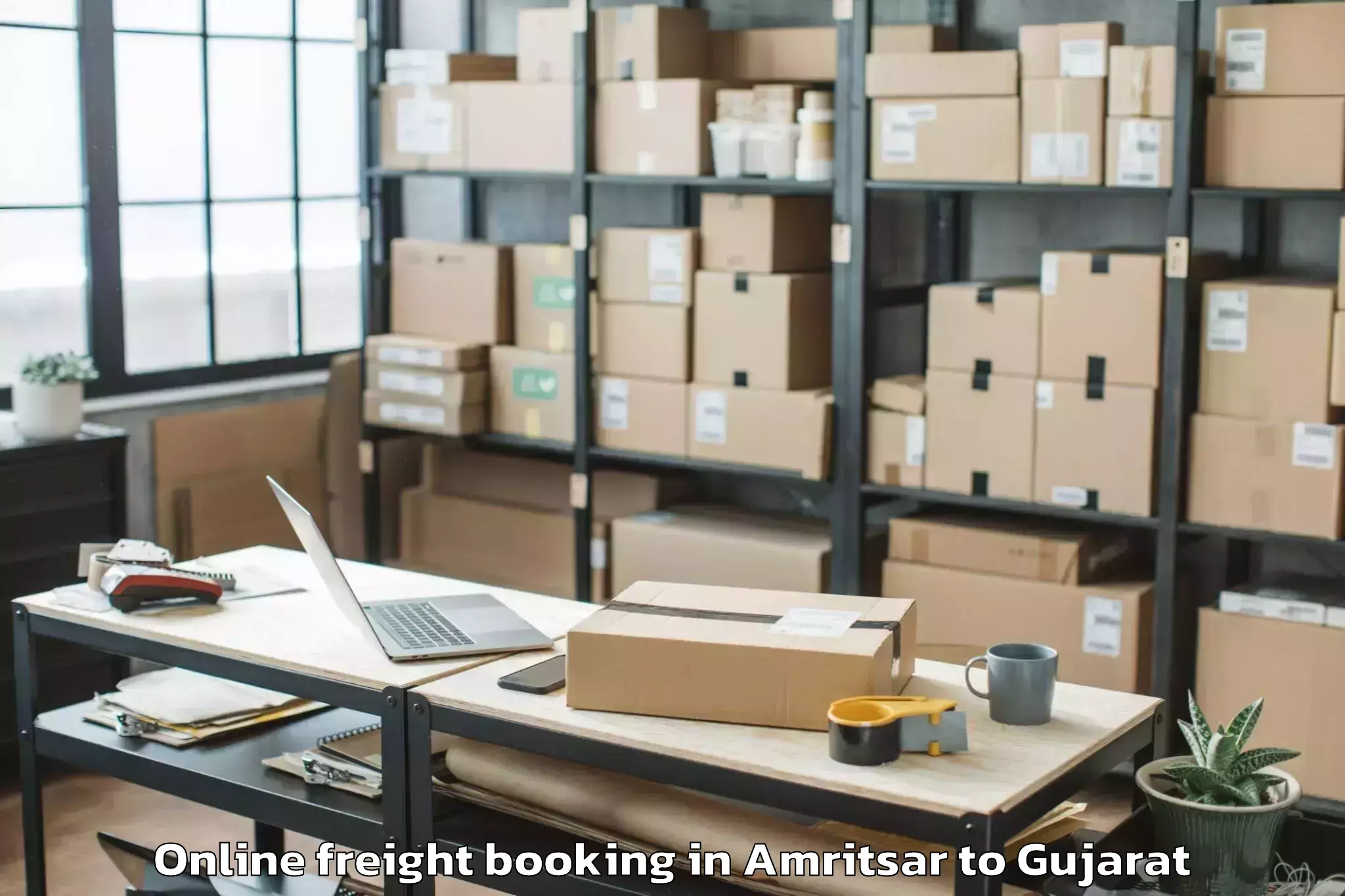 Book Amritsar to Crystal Mall Rajkot Online Freight Booking Online